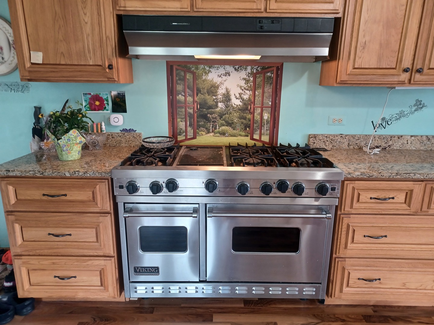 8206 Bull Valley Road Bull Valley, IL 60098 - Photo 53 of 56 a stove top oven sitting inside of a kitchen and granite counter tops