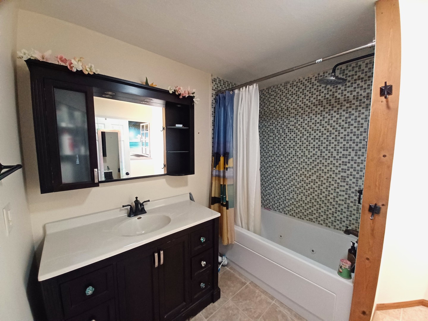 8206 Bull Valley Road Bull Valley, IL 60098 - Photo 55 of 56 a bathroom with a double vanity sink mirror and bathtub
