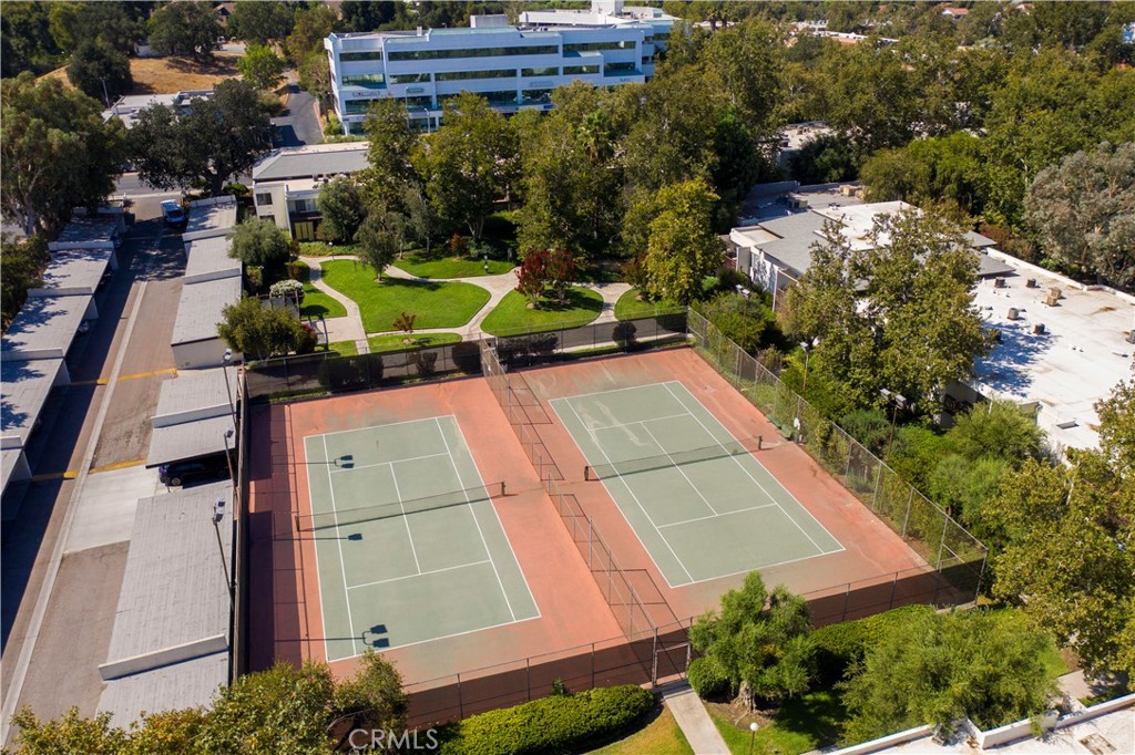 23515 Lyons Avenue, Unit 277 Valencia, CA 91355 - Photo 23 of 29 an aerial view of a house with a yard and plants