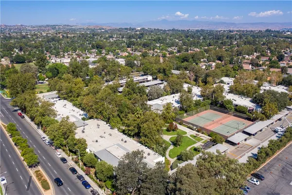 an aerial view of building with outdoor space