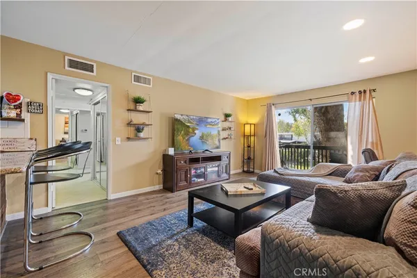a living room with furniture and a table