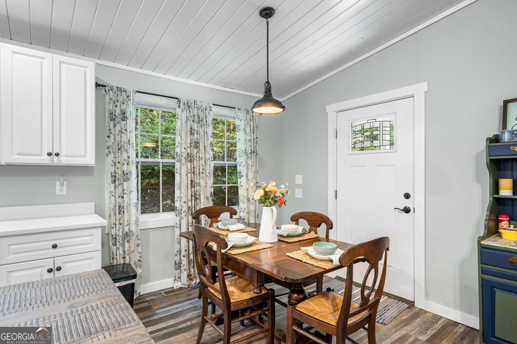 270 Hiawassee River Road Murphy, NC 28906 - Photo 15 of 50 a view of a dining room with furniture window and outside view