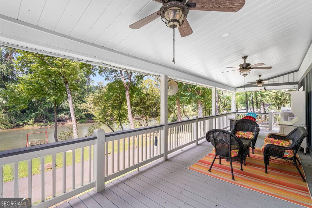 270 Hiawassee River Road Murphy, NC 28906 - Photo 28 of 50 a view of a dining room with furniture window and outside view