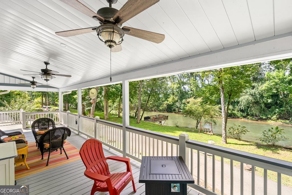 270 Hiawassee River Road Murphy, NC 28906 - Photo 31 of 50 a view of a porch with furniture and a yard