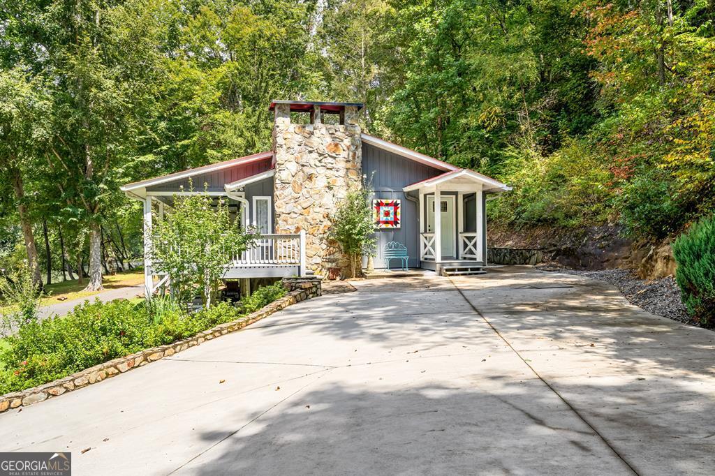 270 Hiawassee River Road Murphy, NC 28906 - Photo 33 of 50 front view of a house with a yard