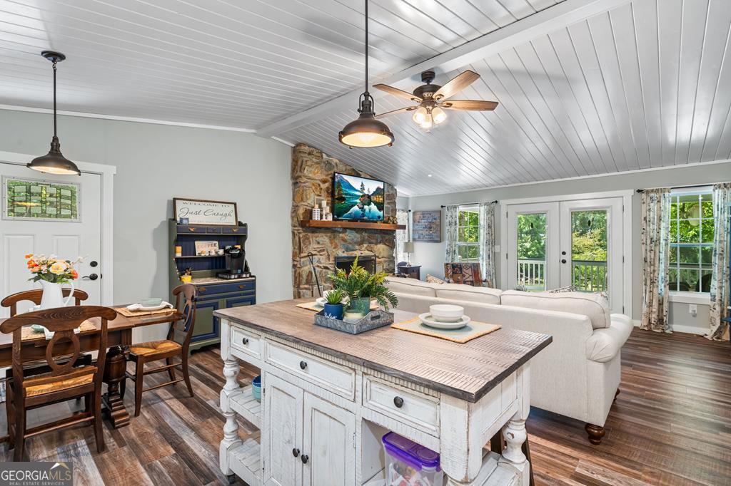 270 Hiawassee River Road Murphy, NC 28906 - Photo 8 of 50 a view of a dining room with furniture a chandelier and wooden floor