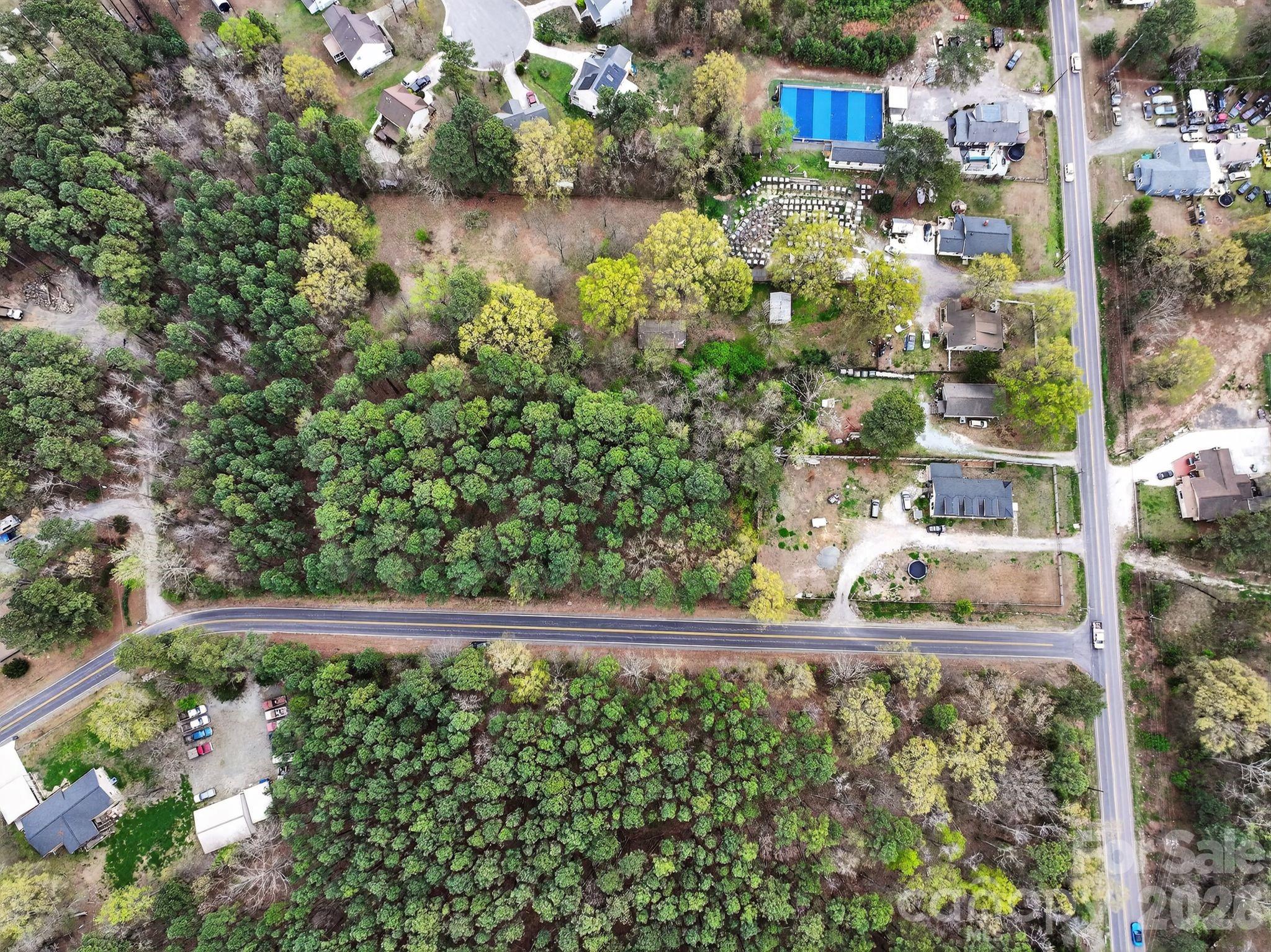 1535 Ruritan Road Durham, NC 27703 - Photo 2 of 10 a view of a garden with a tree