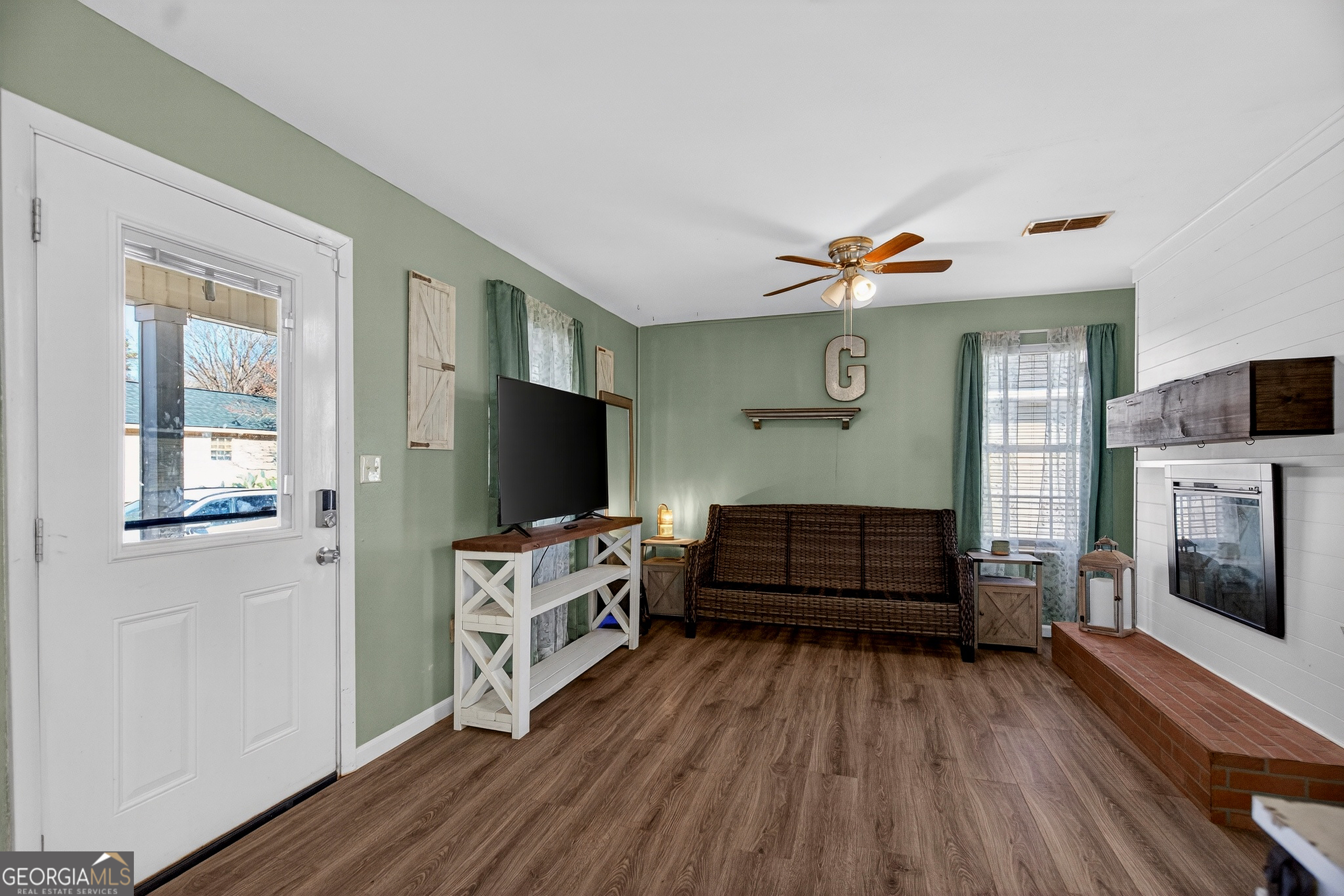 109 Garfield Street LaGrange, GA 30240 - Photo 5 of 14 a living room with furniture and a flat screen tv