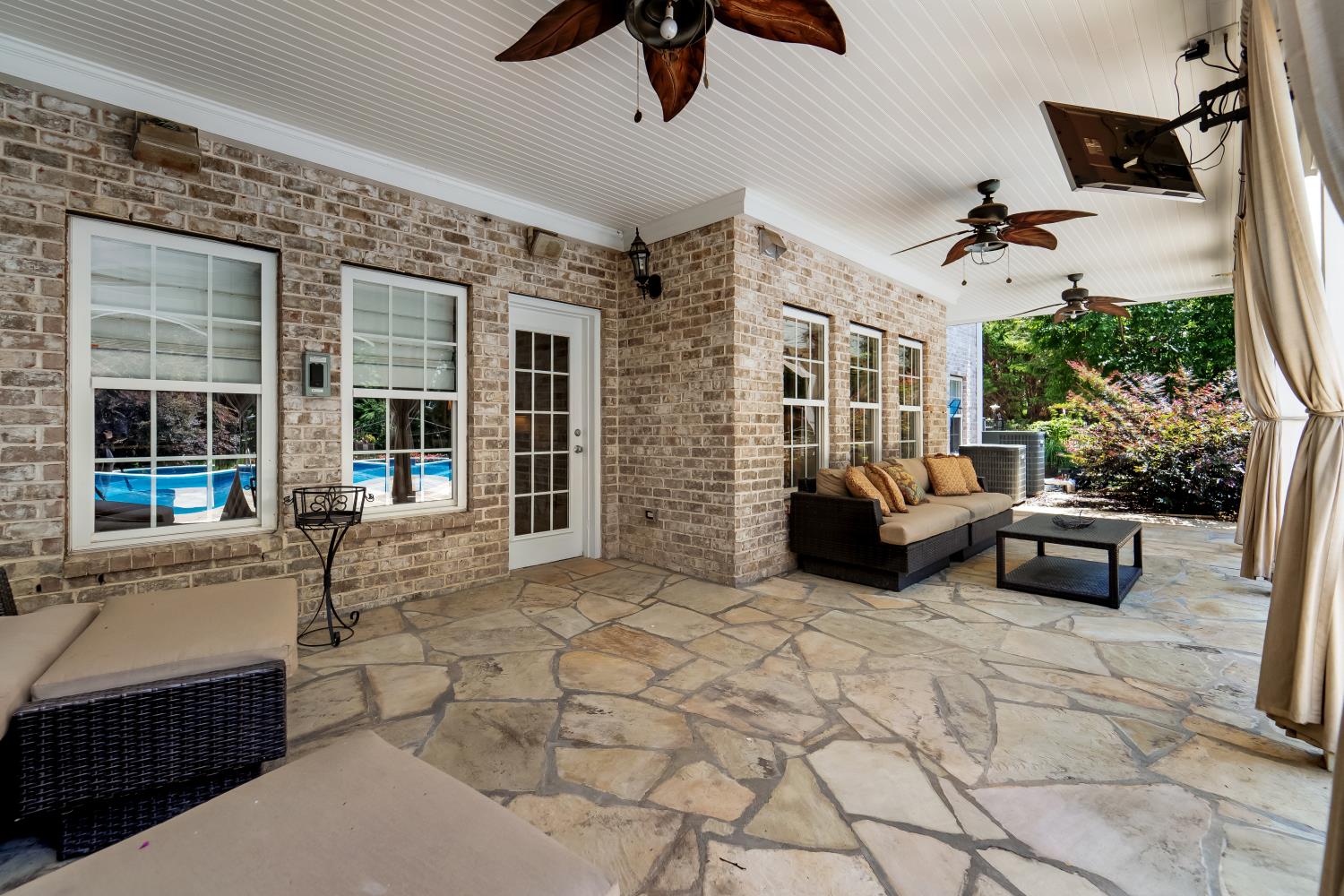 1621 Fair House Road Spring Hill, TN 37174 - Photo 23 of 30 a view of a patio with couches and potted plants
