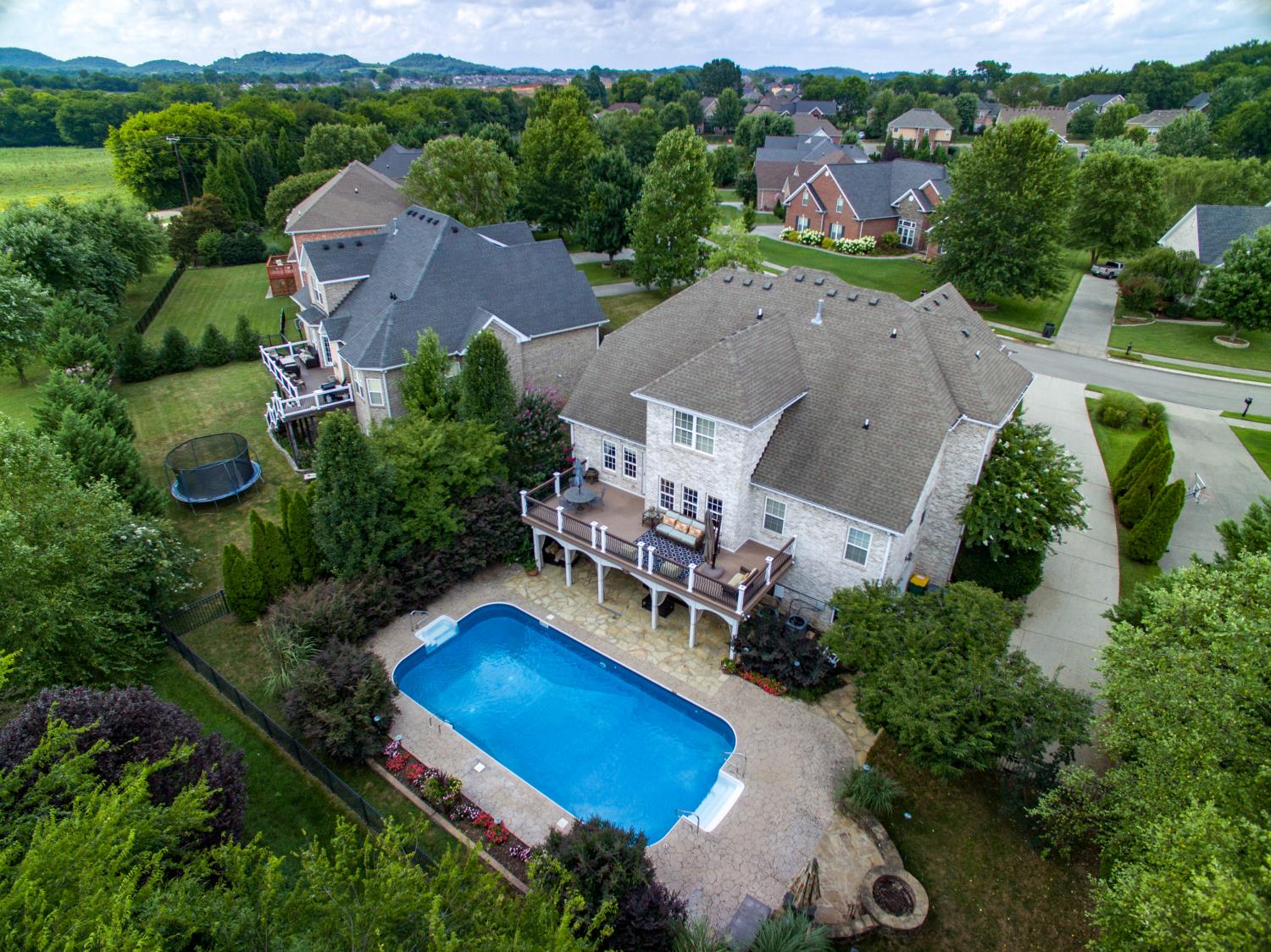 1621 Fair House Road Spring Hill, TN 37174 - Photo 28 of 30 an aerial view of a house with garden space and street view