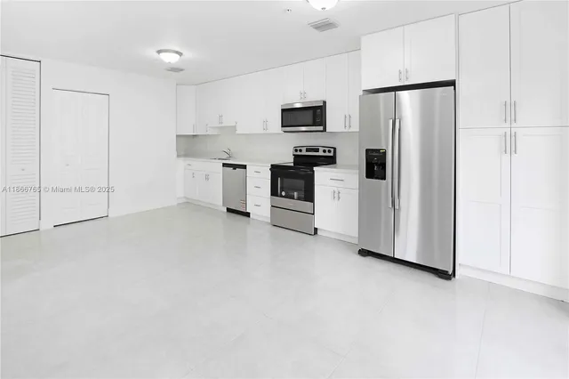 a utility room with a sink