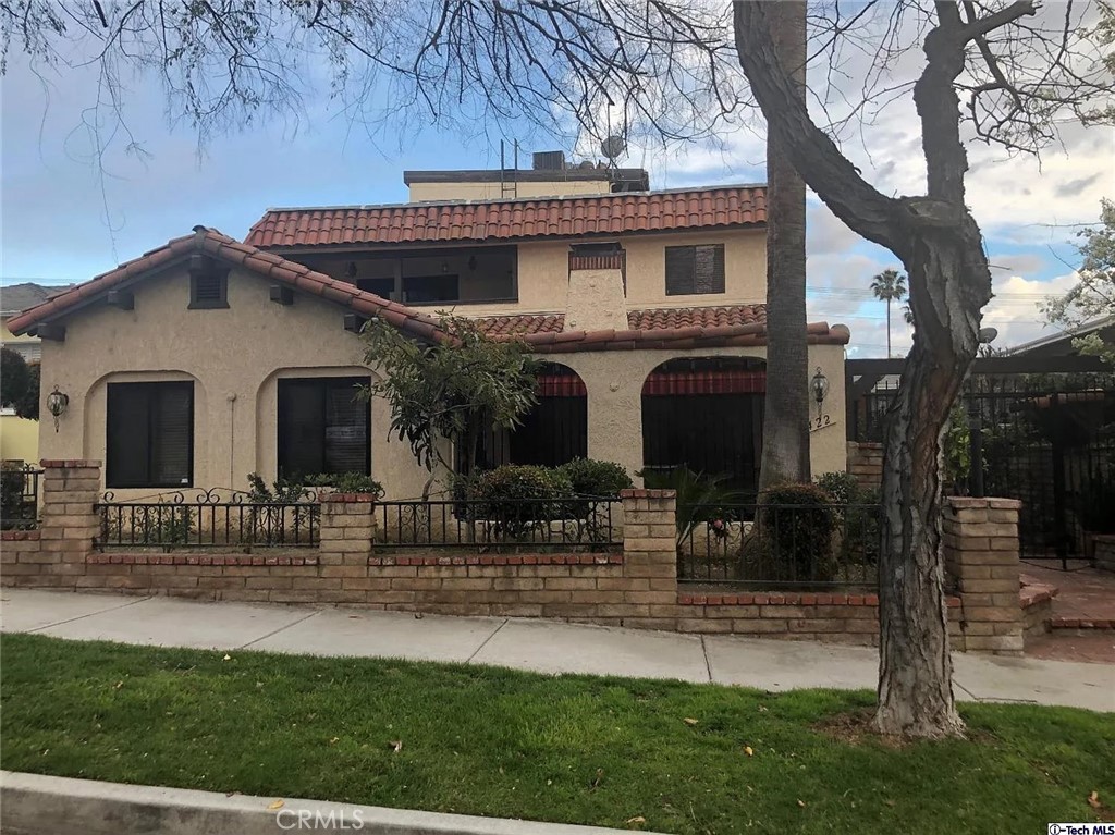 422 East Harvard Road Burbank, CA 91501 - Photo 1 of 1 a front view of house with yard and green space