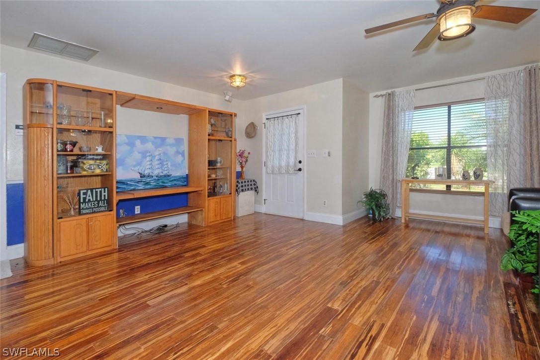 17485 Oriole Road Fort Myers, FL 33967 - Photo 6 of 35 a living room with furniture and wooden floor