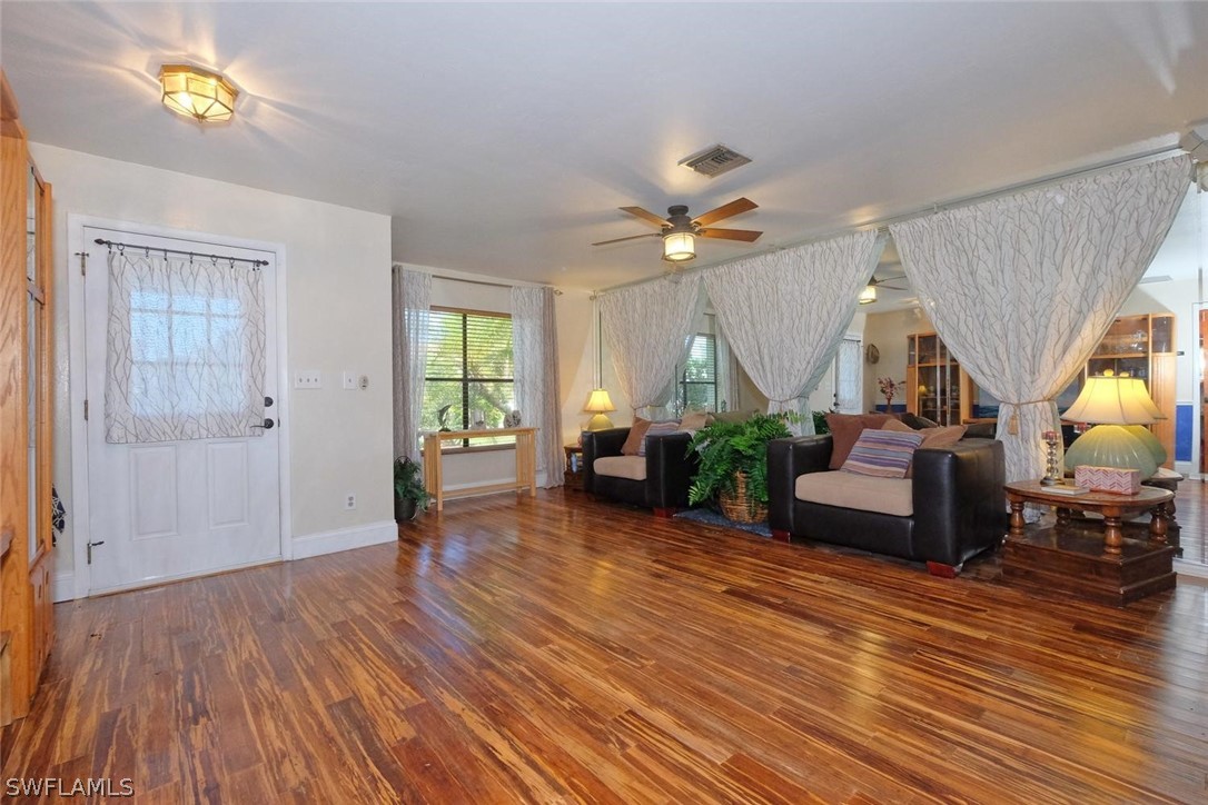 17485 Oriole Road Fort Myers, FL 33967 - Photo 7 of 35 a living room with furniture and a wooden floor