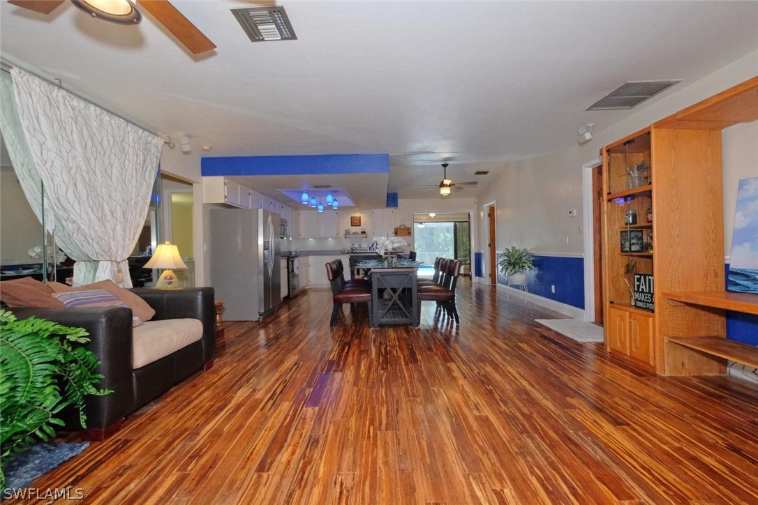 17485 Oriole Road Fort Myers, FL 33967 - Photo 8 of 35 a living room with furniture and wooden floor