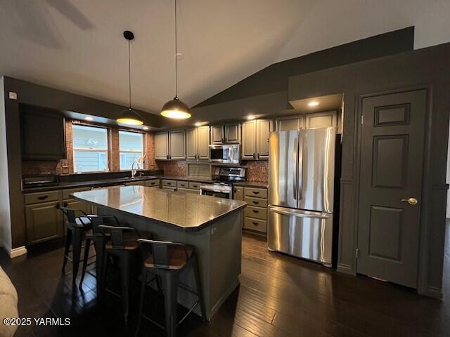 2005 Lakeview Drive Yakima, WA 98902 - Photo 14 of 35 a kitchen with stainless steel appliances granite countertop a sink a stove and a refrigerator
