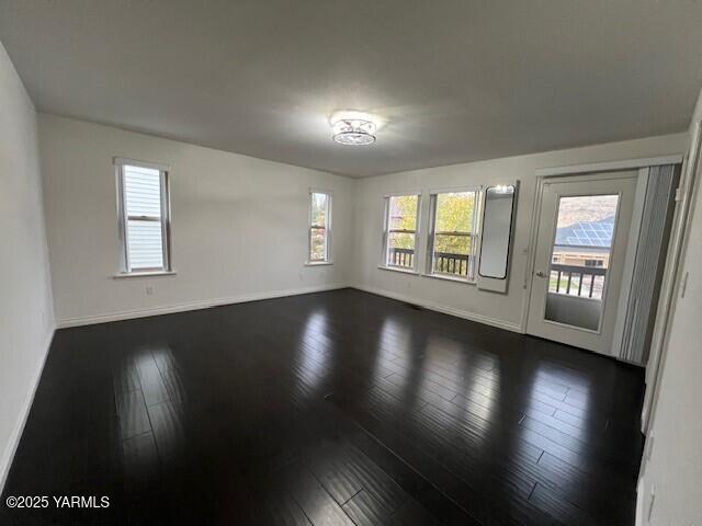 2005 Lakeview Drive Yakima, WA 98902 - Photo 16 of 35 an empty room with wooden floor and windows