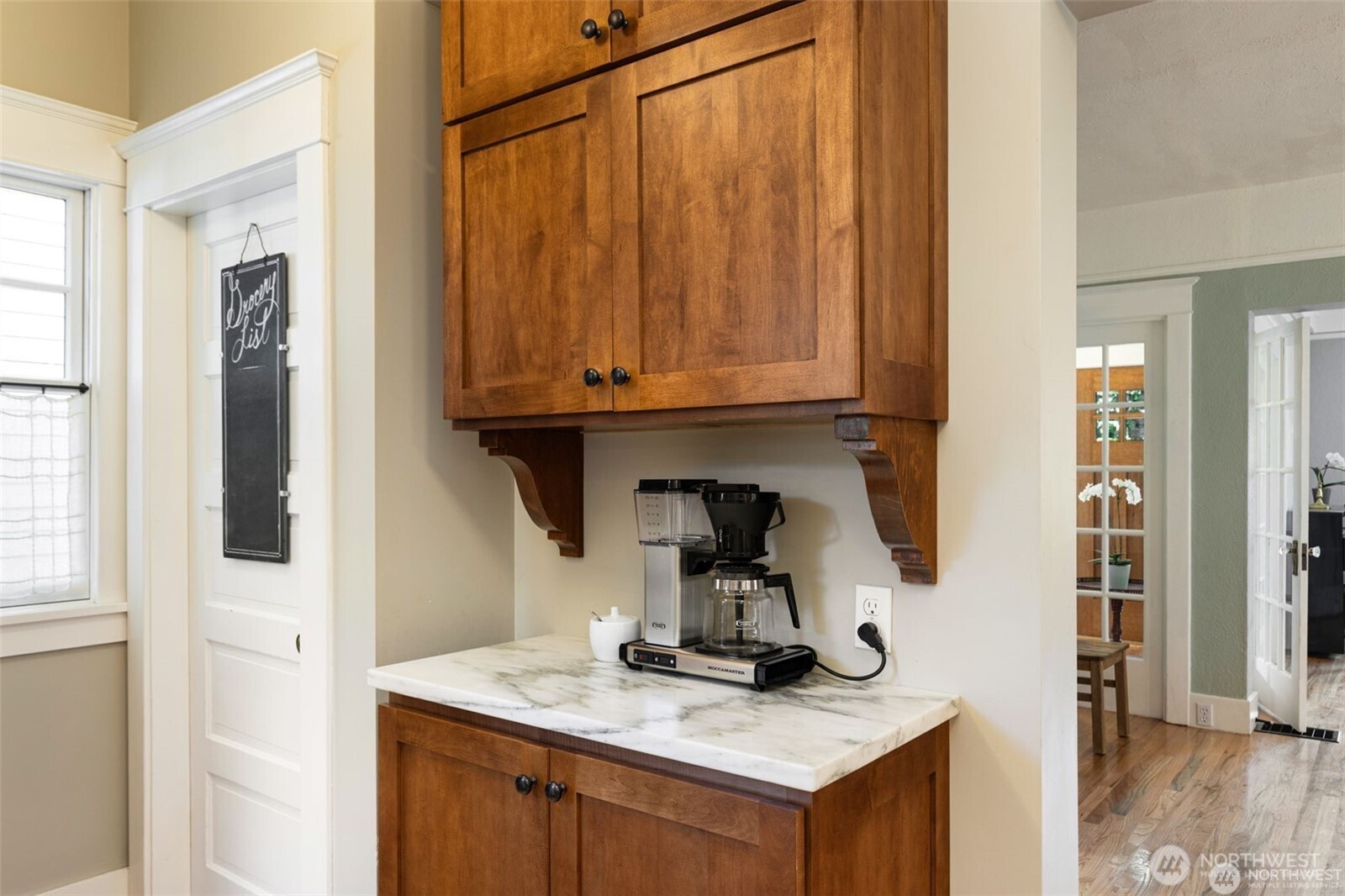 2430 8th Avenue West Seattle, WA 98119 - Photo 13 of 34 a kitchen with a sink a stove and a refrigerator