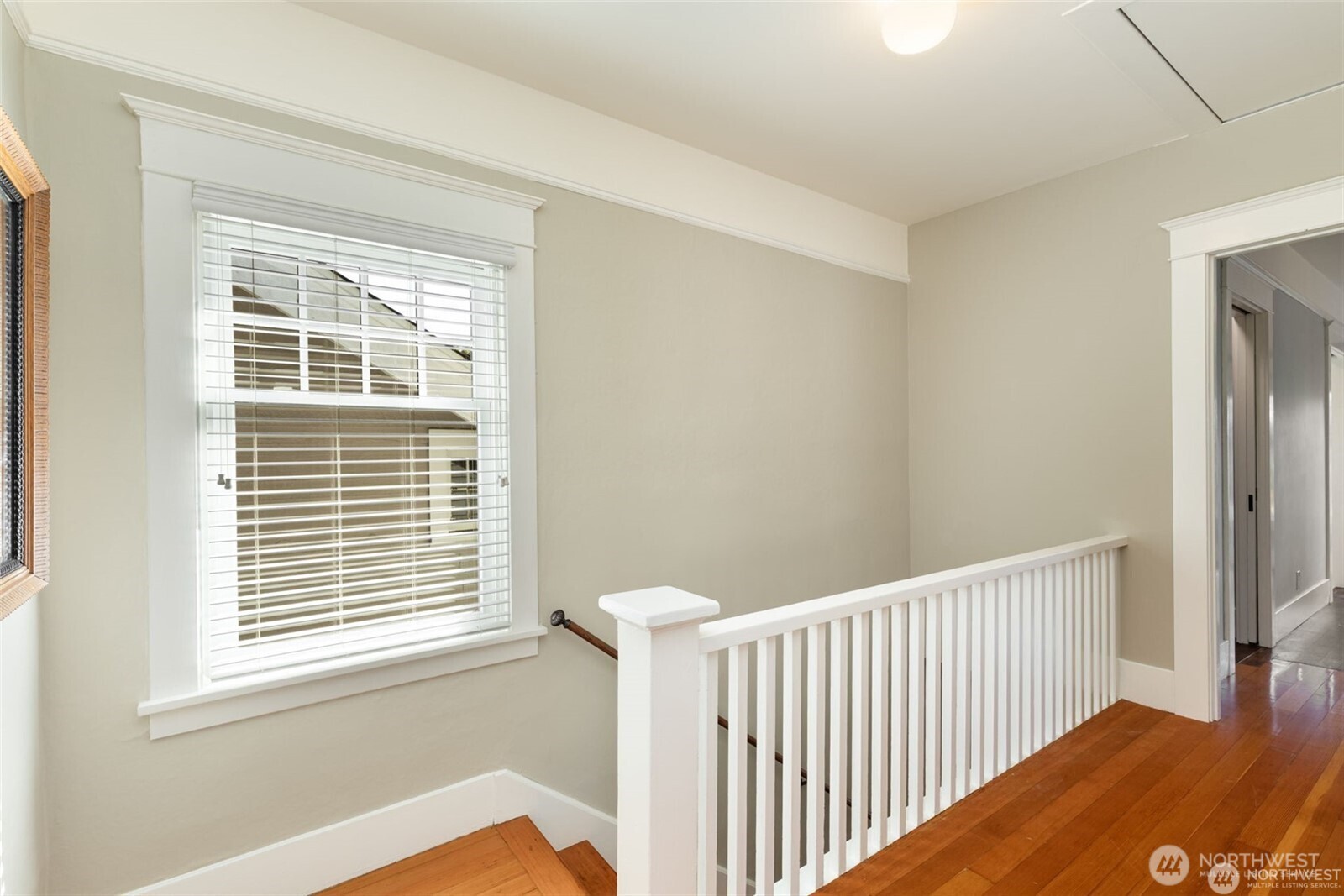 2430 8th Avenue West Seattle, WA 98119 - Photo 15 of 34 a view of a bedroom with a window