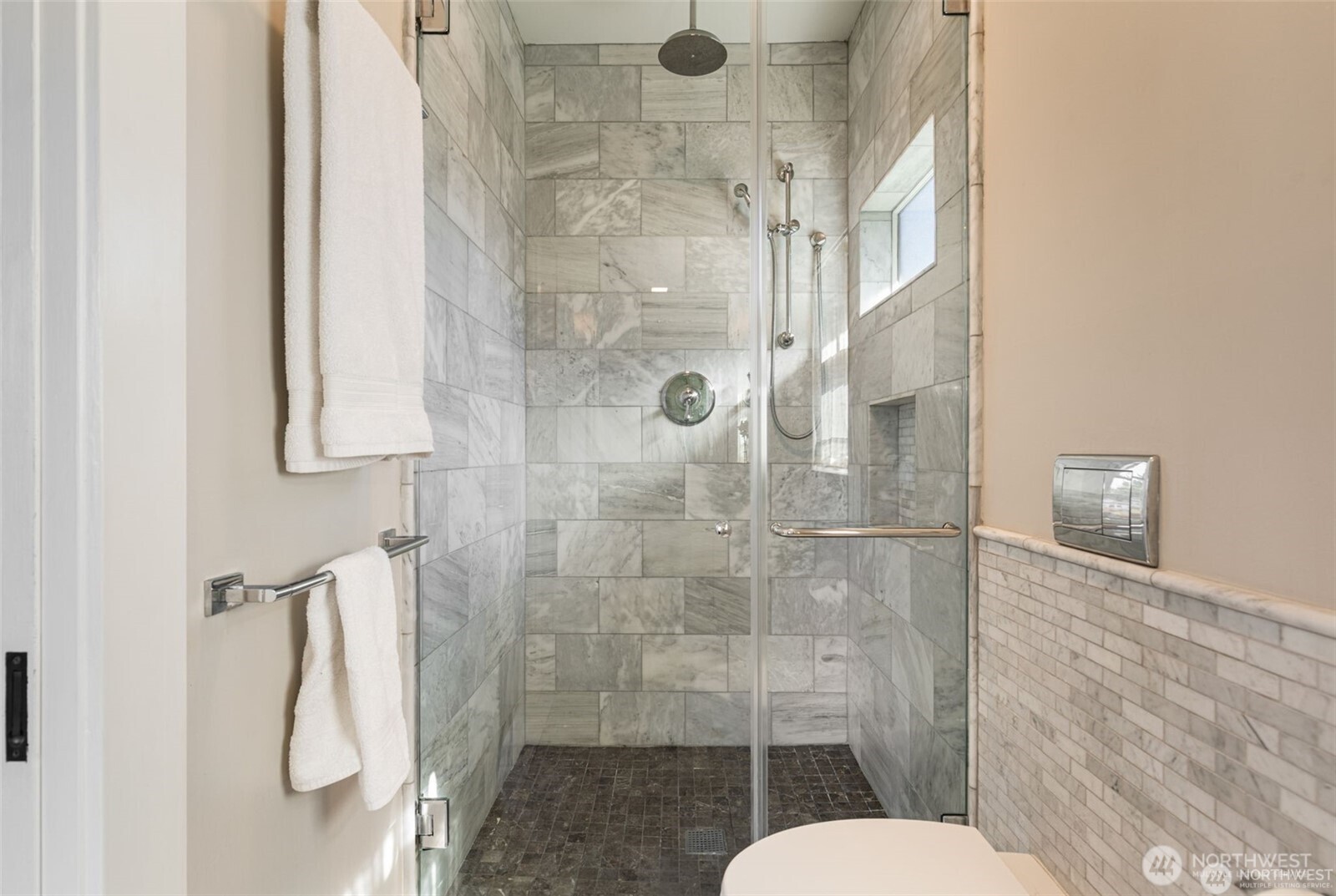 2430 8th Avenue West Seattle, WA 98119 - Photo 20 of 34 a bathroom with a shower and toilet