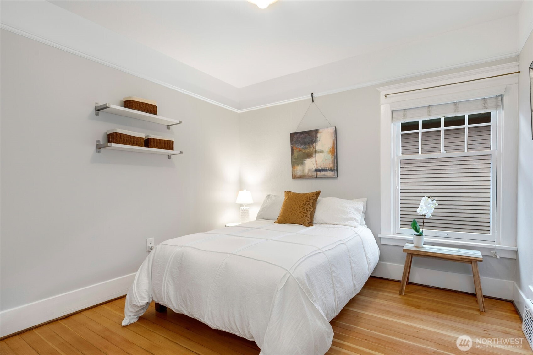 2430 8th Avenue West Seattle, WA 98119 - Photo 24 of 34 a bedroom with a bed and a night stand