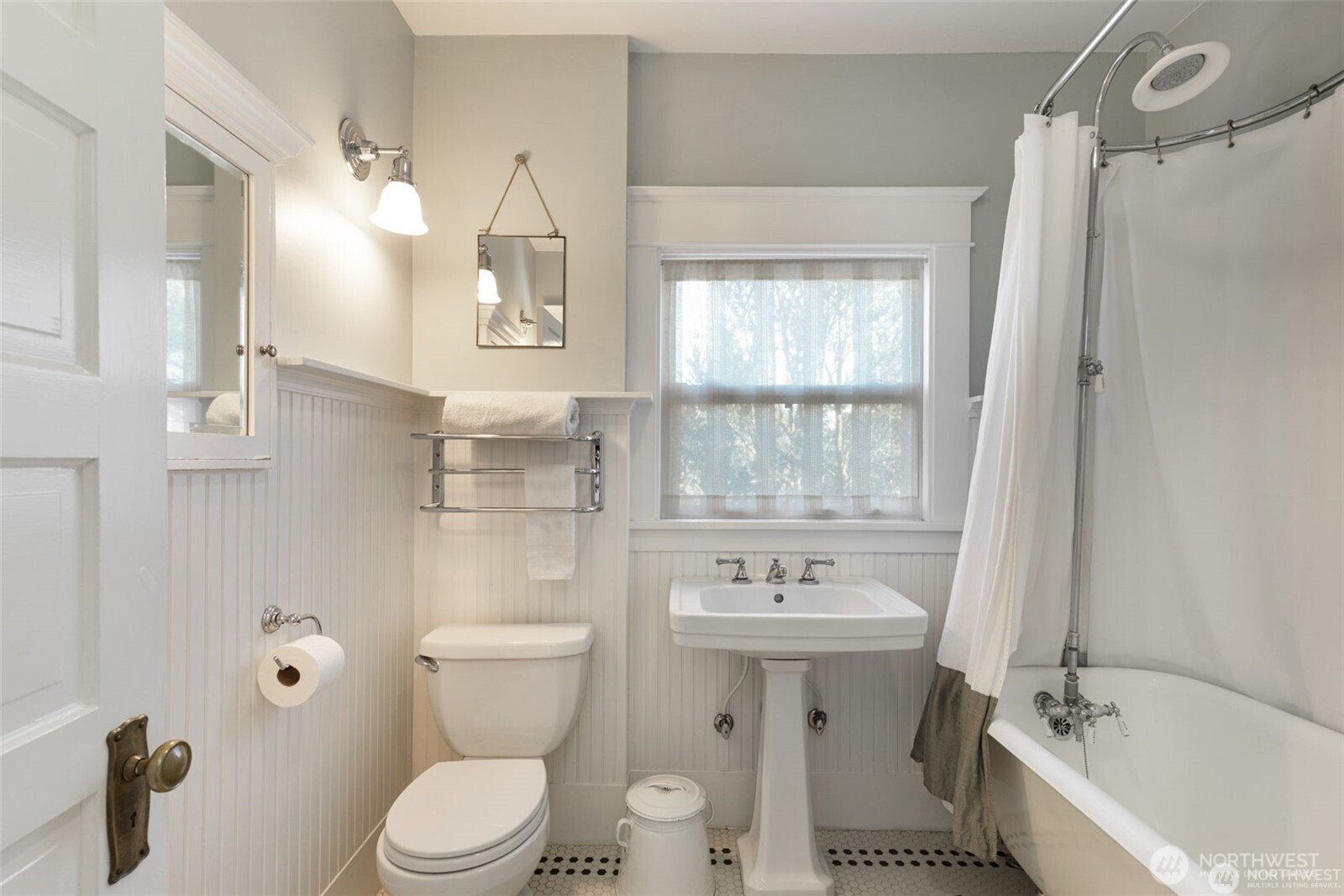 2430 8th Avenue West Seattle, WA 98119 - Photo 25 of 34 a bathroom with a sink toilet and shower