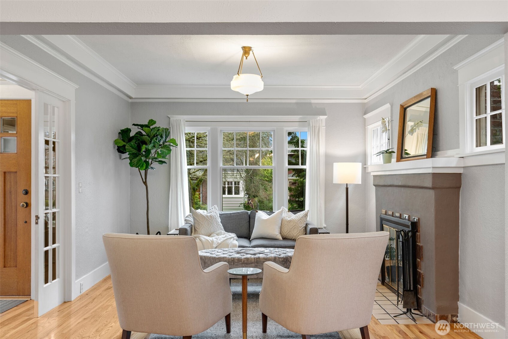 2430 8th Avenue West Seattle, WA 98119 - Photo 5 of 34 a view of a dining room with furniture window and wooden floor
