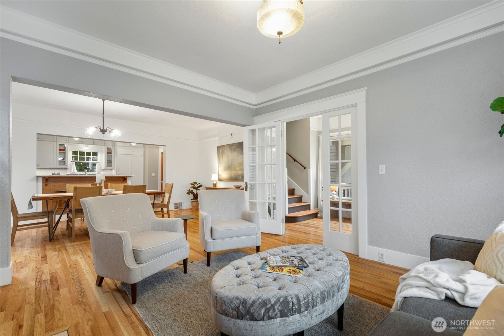 2430 8th Avenue West Seattle, WA 98119 - Photo 6 of 34 a living room with furniture and a table