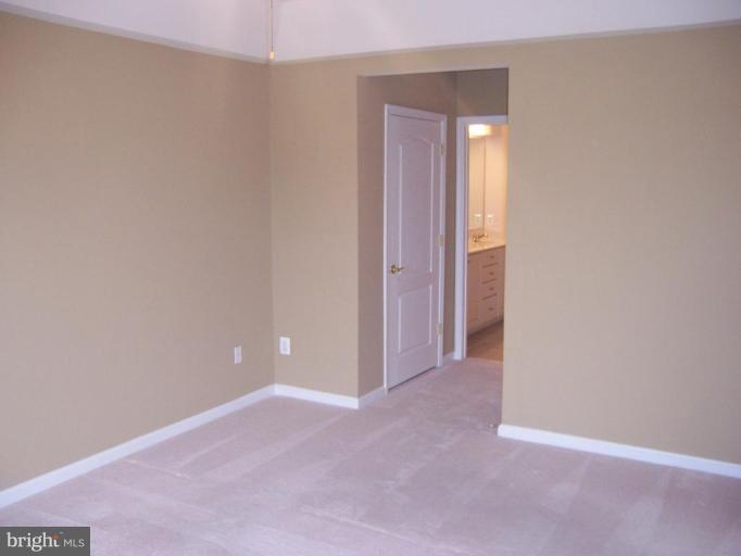 7305 Maplecrest Road, Unit 203 Elkridge, MD 21075 - Photo 15 of 19 Master Bedroom