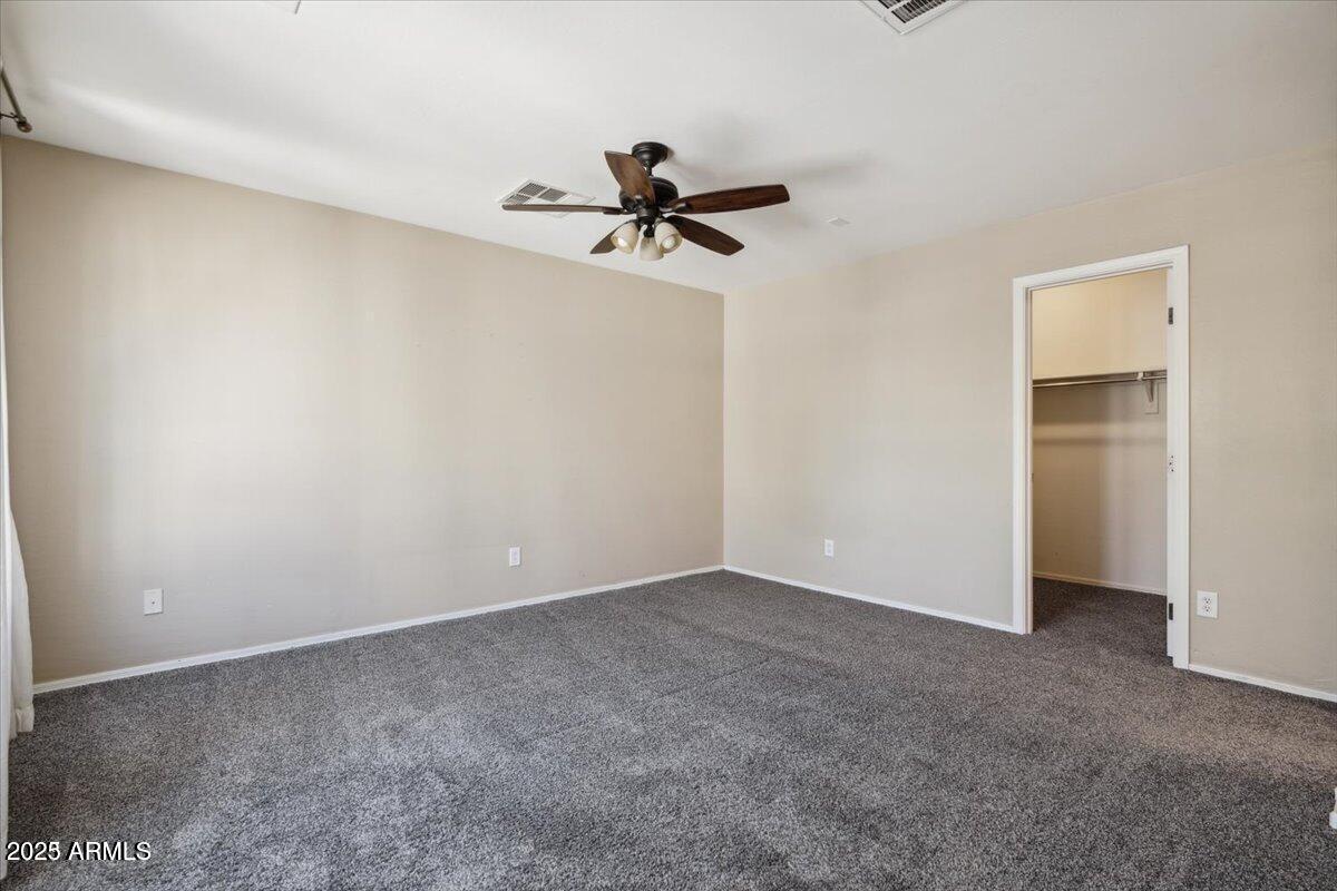 2233 East Pecan Road Phoenix, AZ 85040 - Photo 16 of 18 wooden floor in an empty room