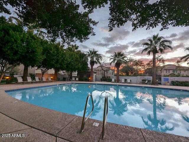 2233 East Pecan Road Phoenix, AZ 85040 - Photo 17 of 18 a view of swimming pool with chairs