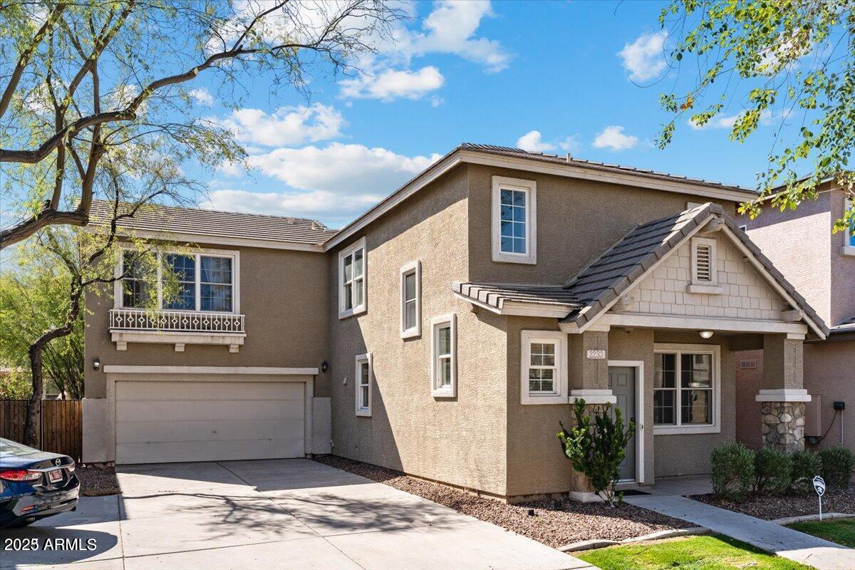 2233 East Pecan Road Phoenix, AZ 85040 - Photo 2 of 18 a front view of a house with garden