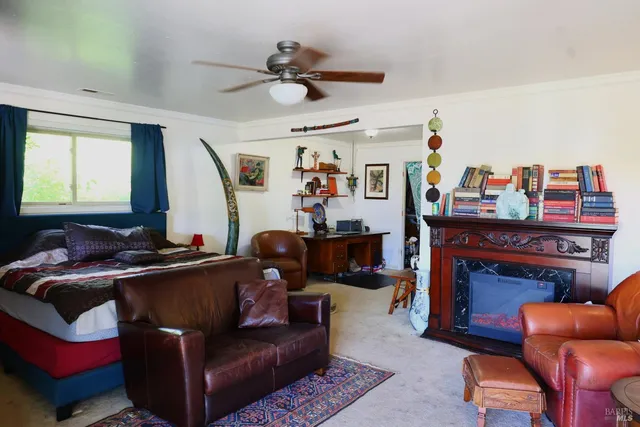 a work room with furniture and a window