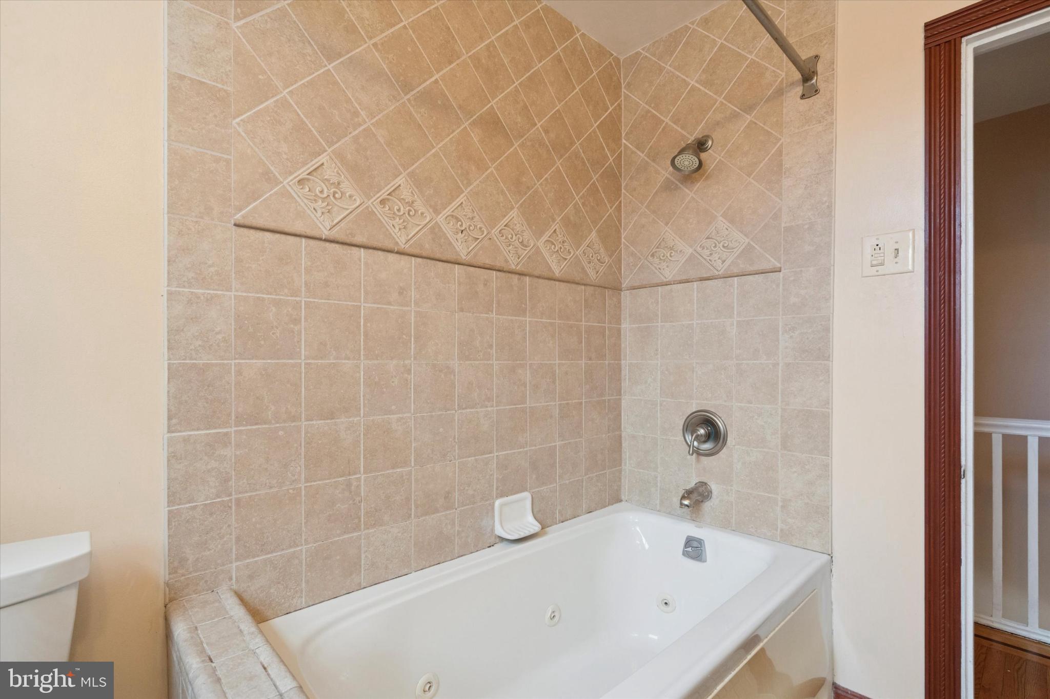 3227 Fuller Street Philadelphia, PA 19136 - Photo 19 of 25 Elegant bathroom with soothing tile accents.