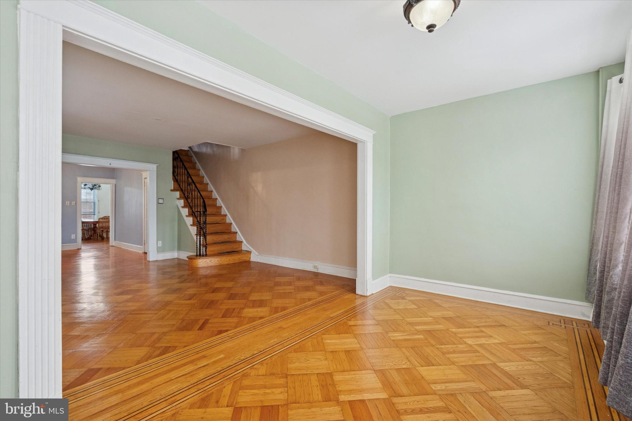 3227 Fuller Street Philadelphia, PA 19136 - Photo 3 of 25 Spacious living area with elegant wood floors.