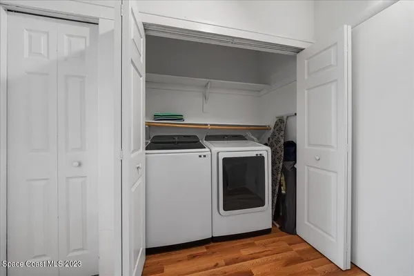 a workspace with furniture and wooden floor