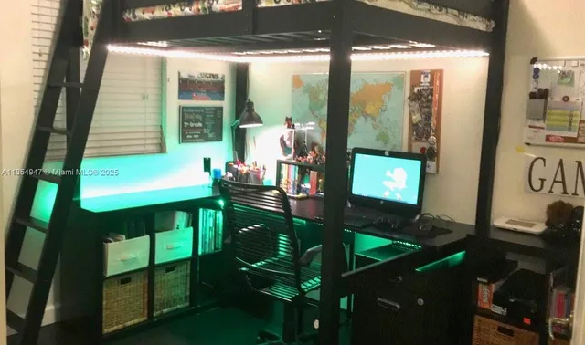 a bed room with a bed and a chair