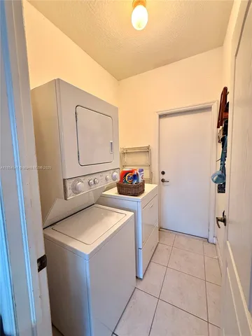 a dining room with furniture window and wooden floor