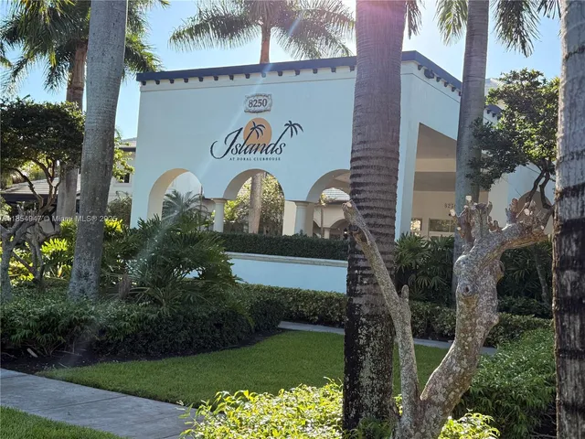 a room with gym equipment and a window