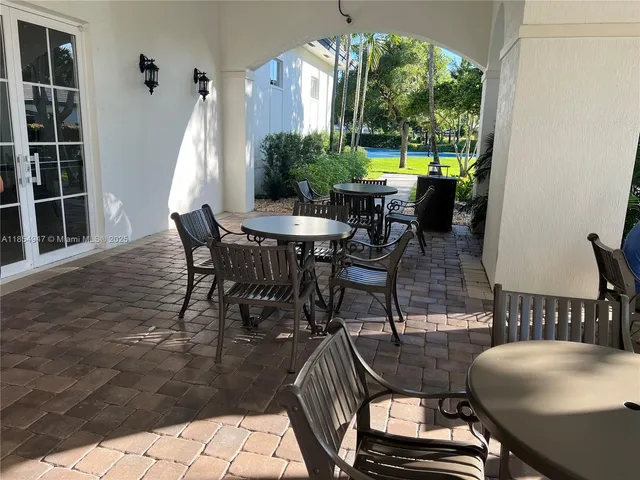 a garden view with a fountain