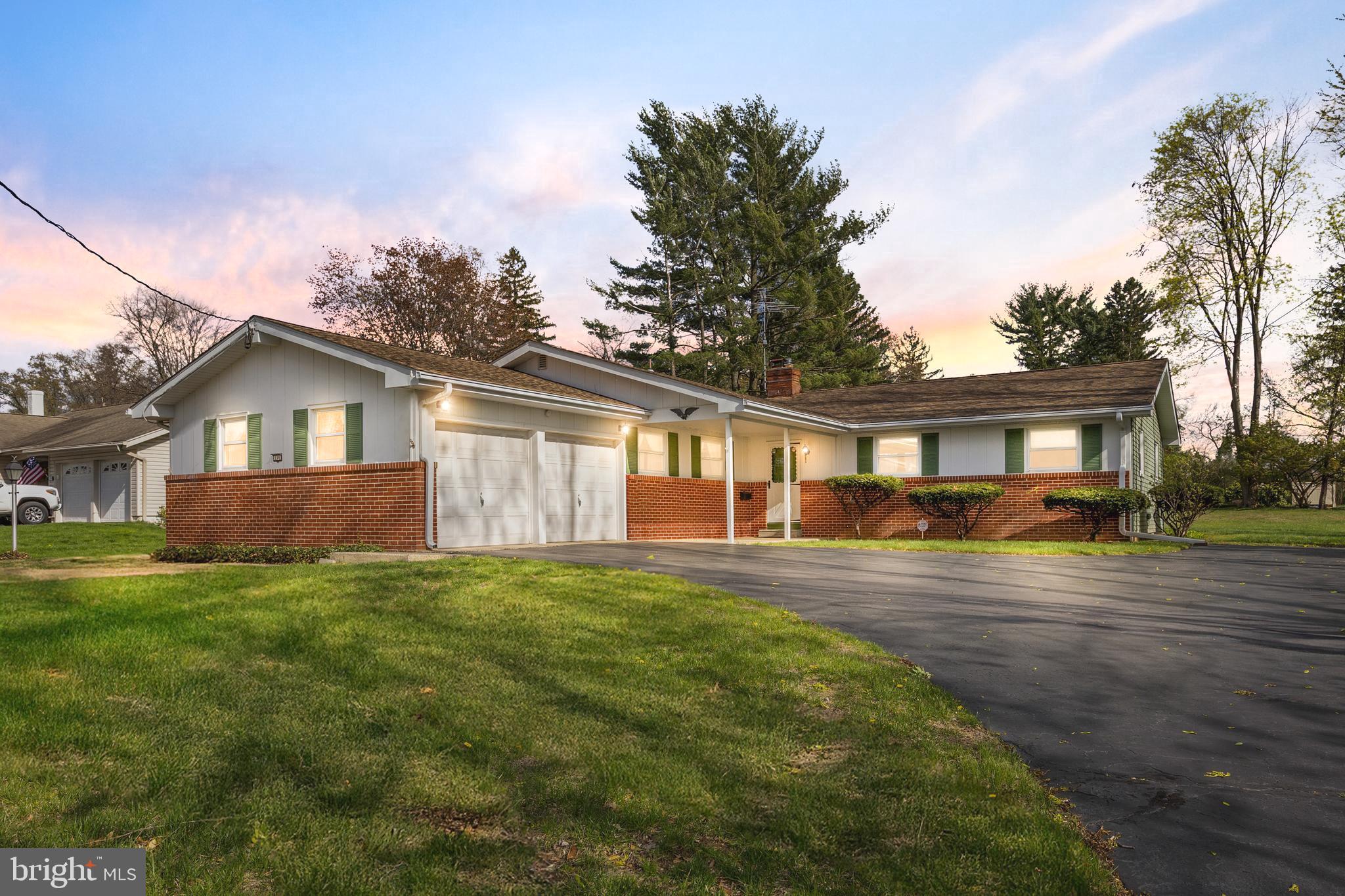 116 Winding Lane Cinnaminson, NJ 08077 - Photo 1 of 1 a front view of a house with a yard and trees