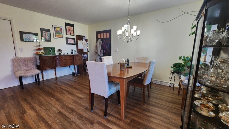 156 Lott Road Wantage, NJ 07461 - Photo 11 of 44 a view of a dining room with furniture and wooden floor