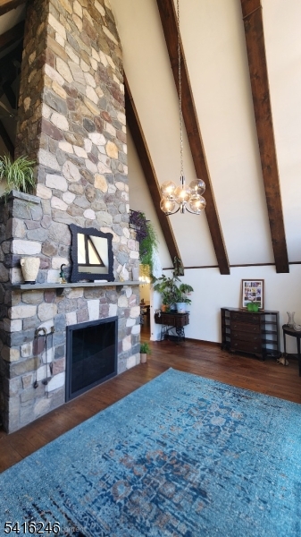 156 Lott Road Wantage, NJ 07461 - Photo 14 of 44 an empty room with fireplace and wooden floor