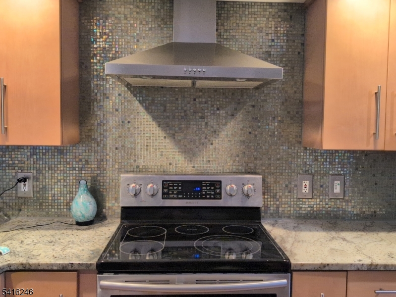156 Lott Road Wantage, NJ 07461 - Photo 17 of 44 a stove top oven sitting inside of a kitchen