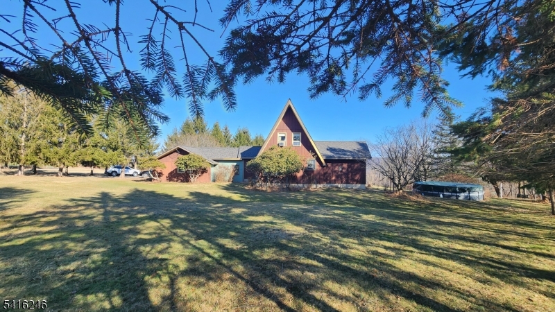 156 Lott Road Wantage, NJ 07461 - Photo 2 of 44 a backyard of a house with lots of green space