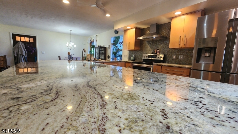 156 Lott Road Wantage, NJ 07461 - Photo 21 of 44 a view of a living room kitchen and a sink