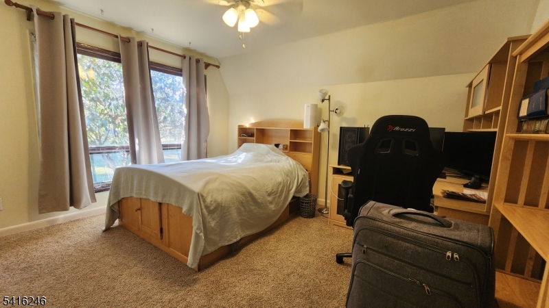 156 Lott Road Wantage, NJ 07461 - Photo 28 of 44 a bedroom with a bed and a window