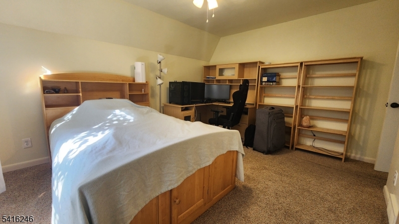 156 Lott Road Wantage, NJ 07461 - Photo 29 of 44 a bed room with a bed and dresser