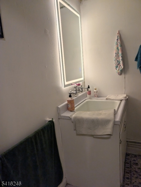 156 Lott Road Wantage, NJ 07461 - Photo 33 of 44 a bathroom with a sink and a mirror