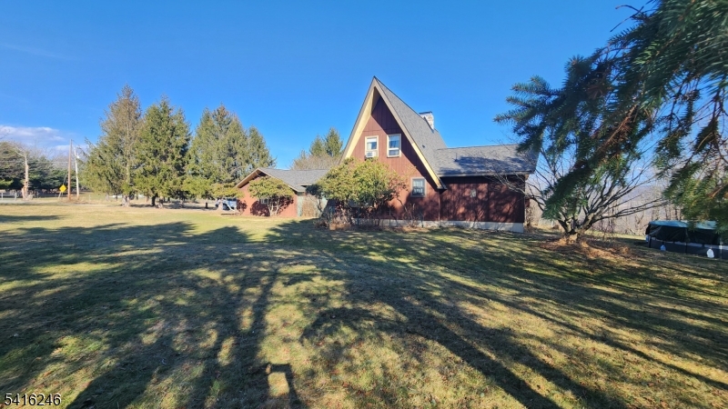 156 Lott Road Wantage, NJ 07461 - Photo 34 of 44 a view of a house with a yard